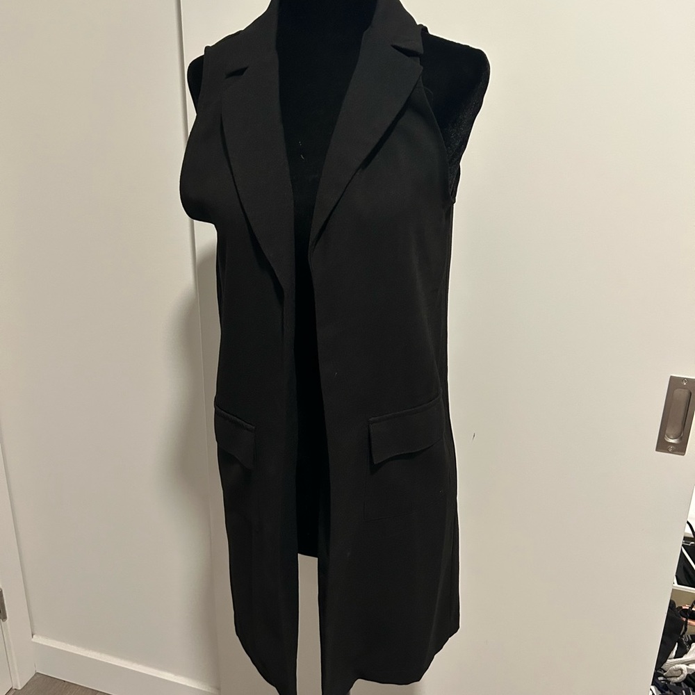 Nice throw over for the office or going out to dinner. Black. Size small.